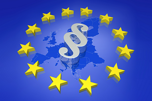 Illustration: Im Hintergrund in blauem Font EU-Länderkarte, im Vordergrund ein Paragraph umringt von den 12 EU-Sternen in gelb