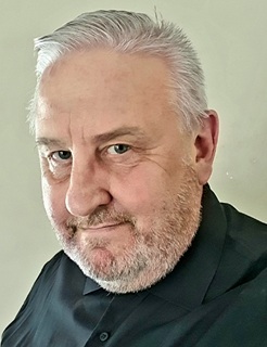 Herr Uwe Becker