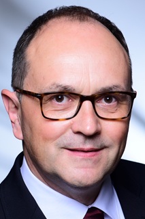 Herr Lars Loebner